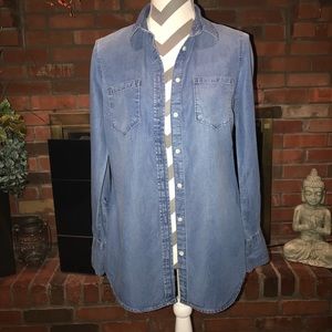 Woman’s button up denim shirt.